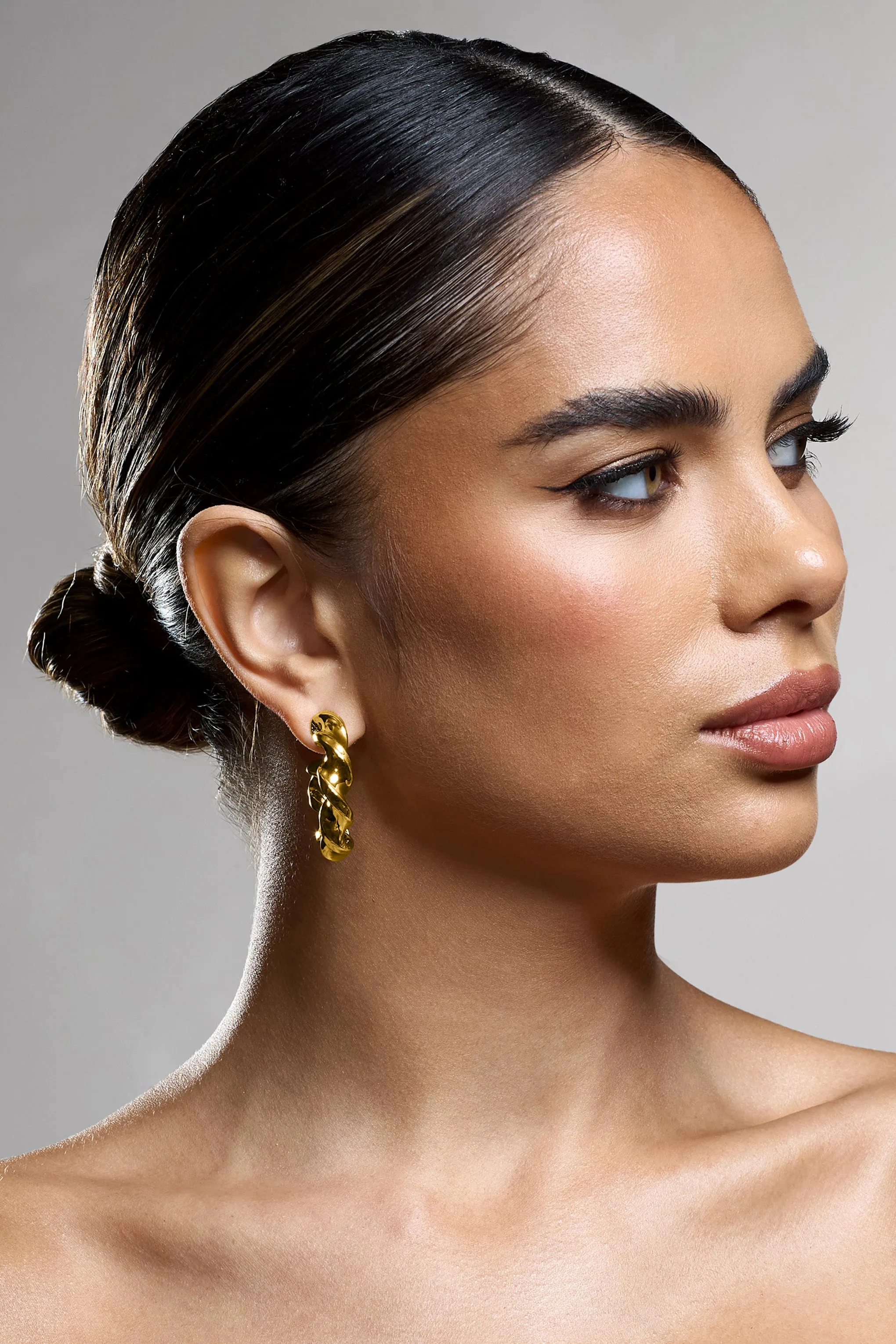 Greta | Gold Twisted Hoop Earrings Club L London