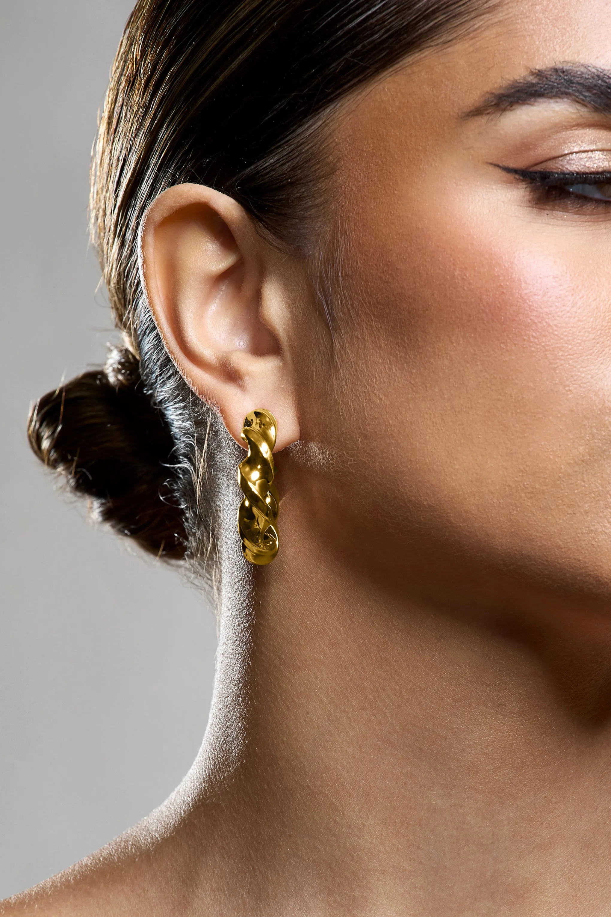 Greta | Gold Twisted Hoop Earrings Club L London