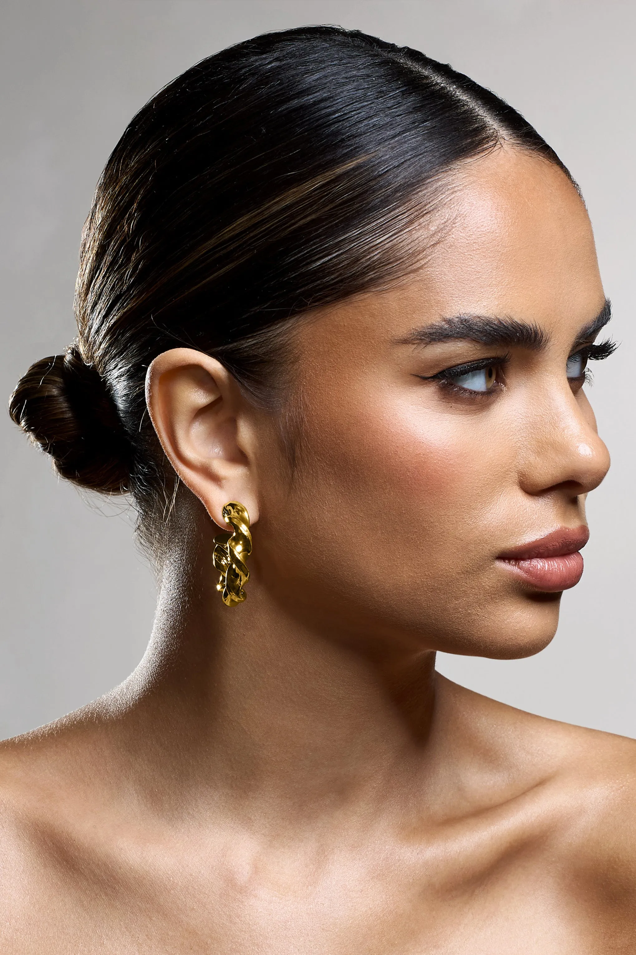 Greta | Gold Twisted Hoop Earrings Club L London