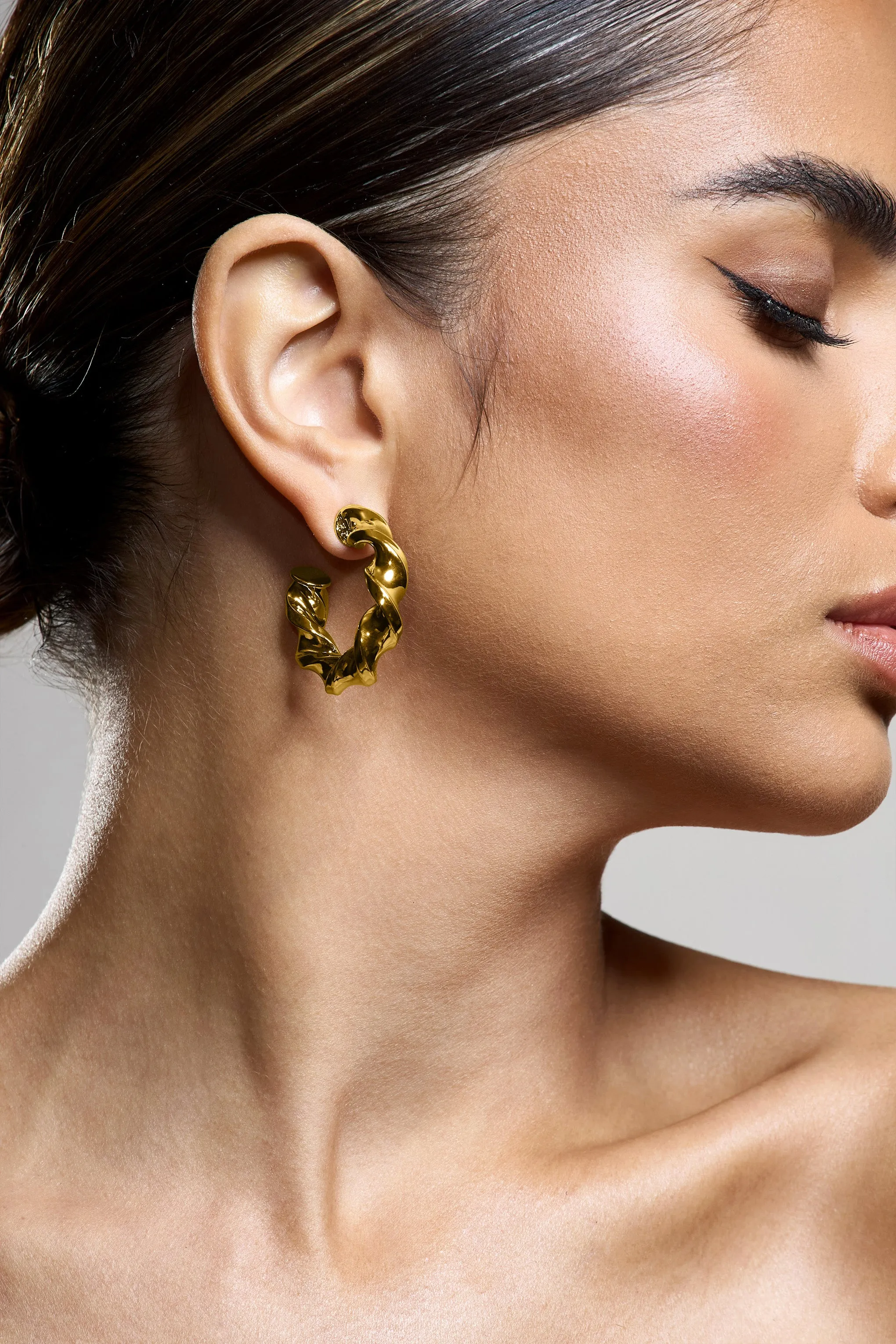 Greta | Gold Twisted Hoop Earrings Club L London